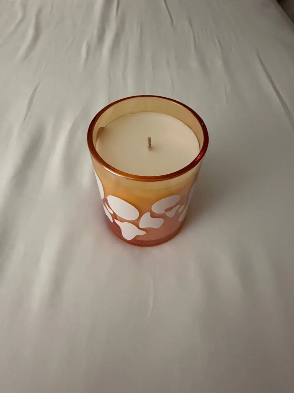 Decorative Orange Glass Candle with White Pattern - Home Accents